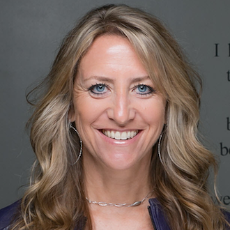 Woman smiling for camera.