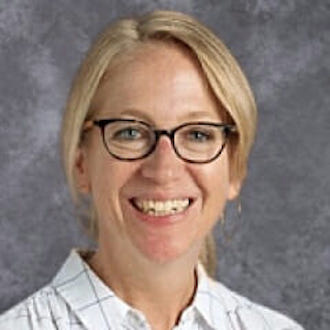 Woman smiling for camera.