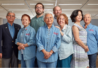 A group of people smiling for the camera.