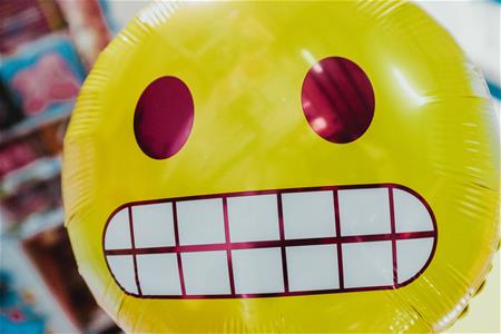 bernard-hermant-bSpqe48INMg-unsplash Concerned emoji balloon.