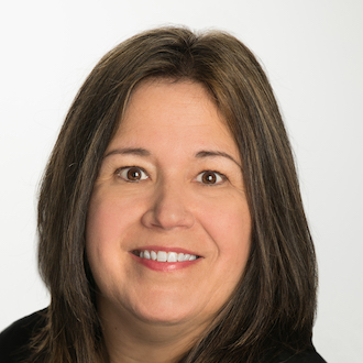 Woman smiling for camera.