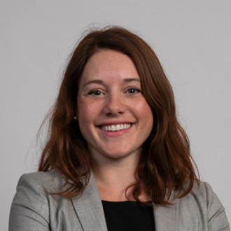 Woman smiling for camera.