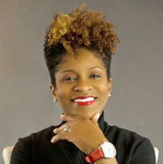 Woman smiling for camera.
