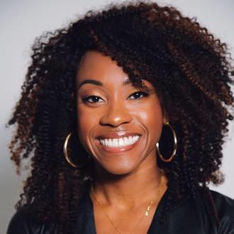 Woman smiling for camera.