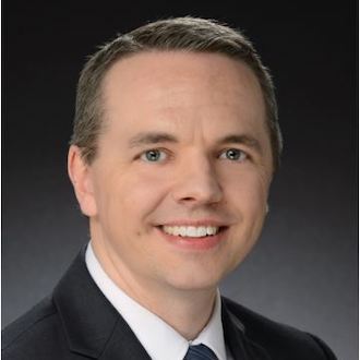 Man smiling for camera.