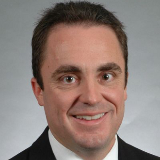 Man smiling for camera.