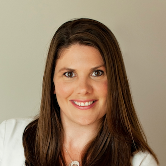 Woman smiling for camera.