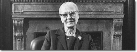 Woman smiling for camera.