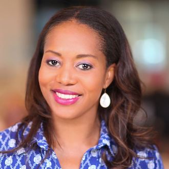 Woman smiling for camera.