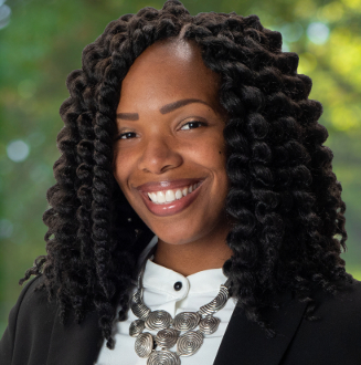 Woman smiling for camera.
