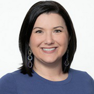 Woman smiling for camera.