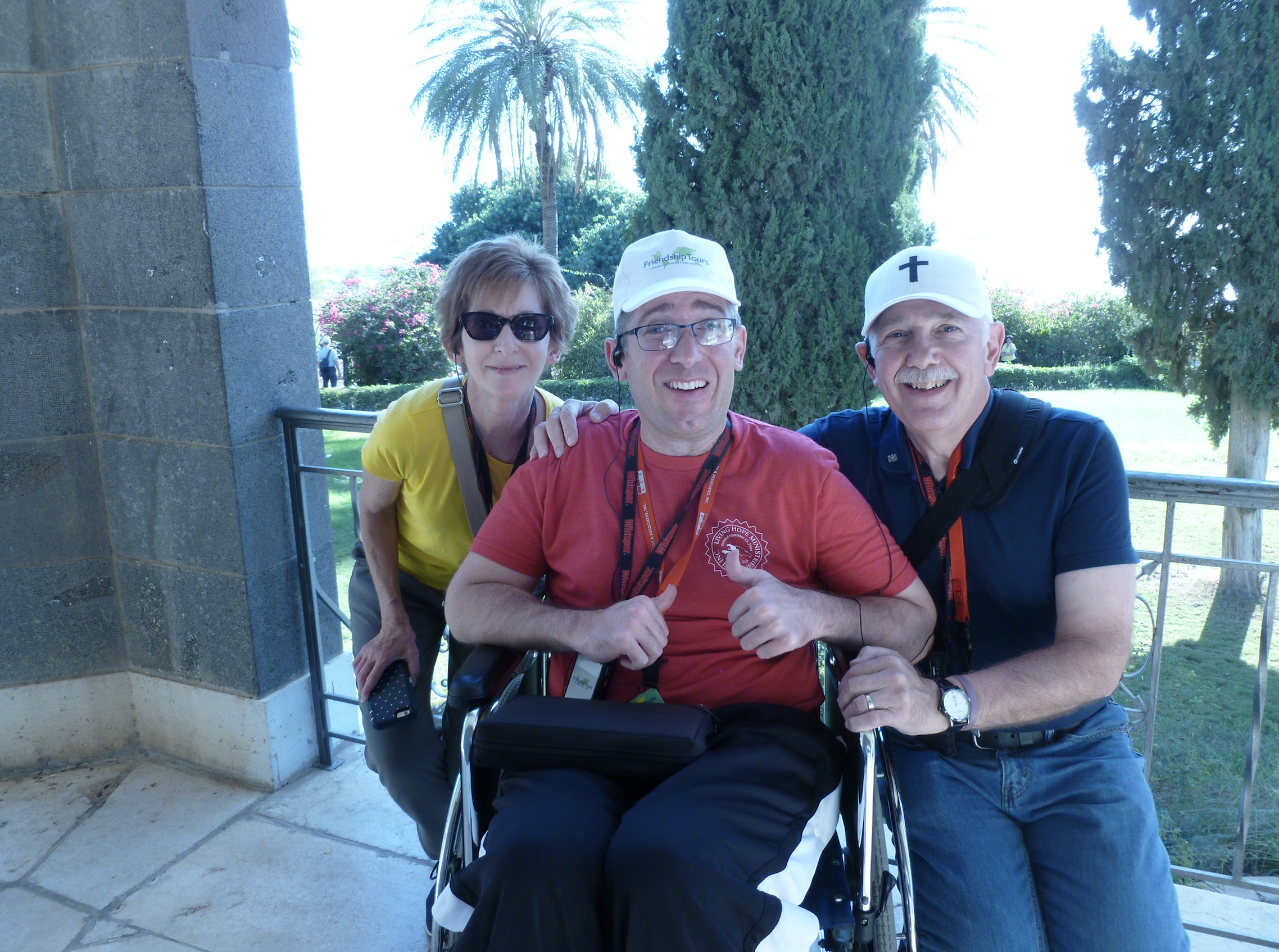 Mother, father, and son smiling and posing for the camera.